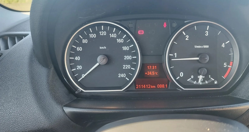 BMW Seria 1 cena 22900 przebieg: 210000, rok produkcji 2009 z Rawicz małe 172